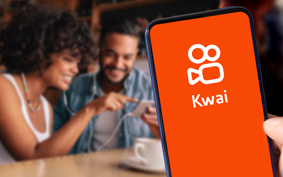 Kwai Live creator hosting an interactive broadcast with AI virtual gifts, audience chat, short videos, and live shopping features